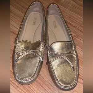 Michael Kors gold loafers